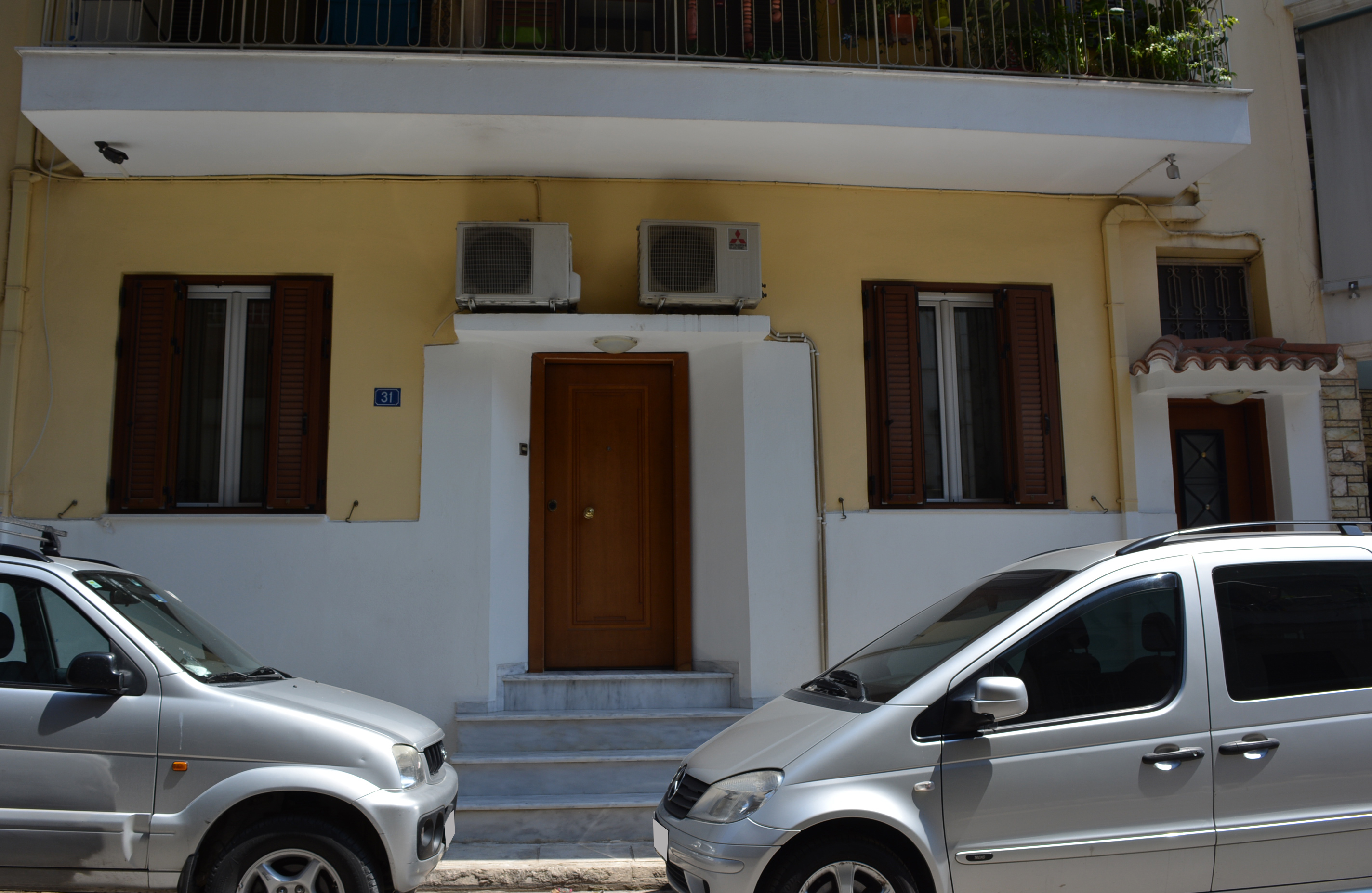 View of the main,eccentric entrance and the windows