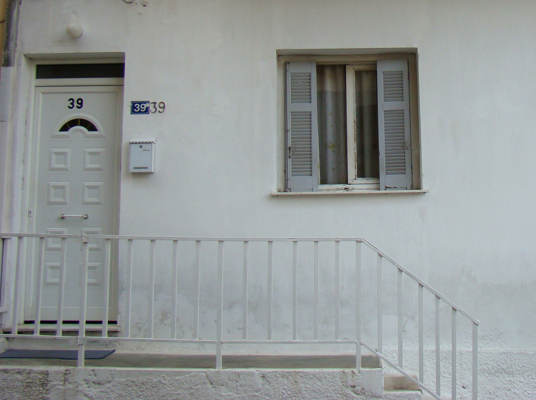 View of the main entrance and window (2014)