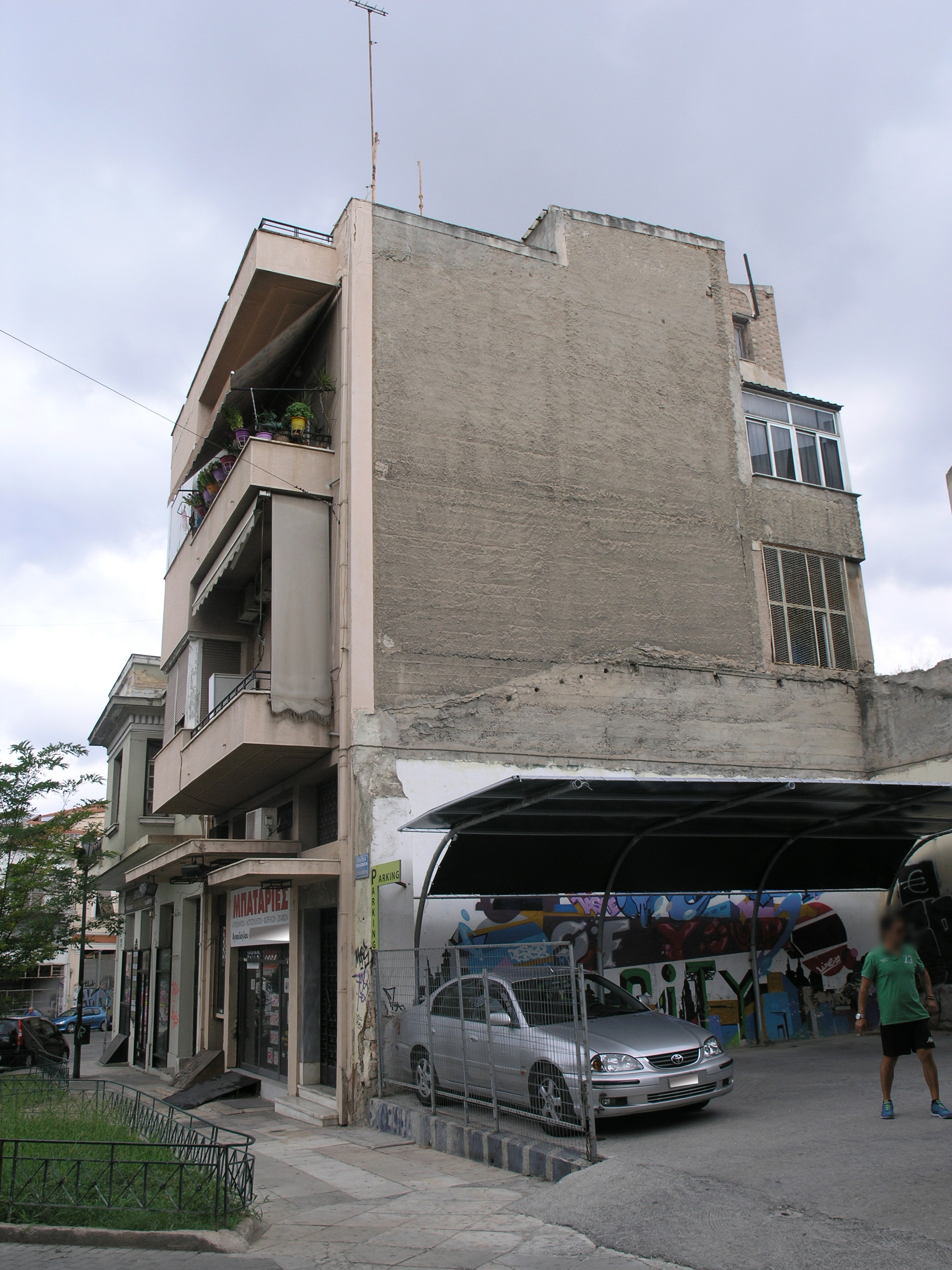 View of main facade and side.