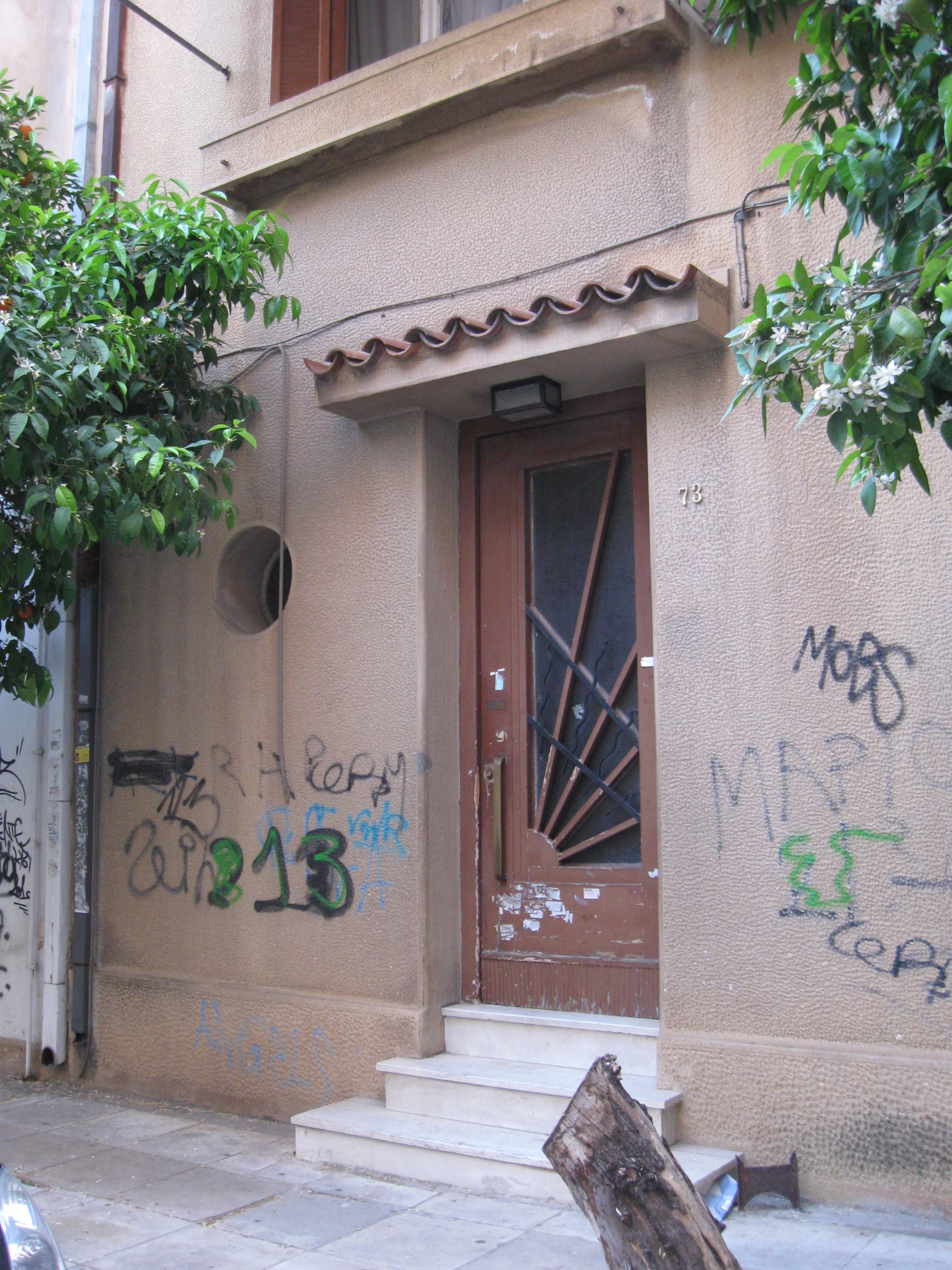 Entrance door and round window